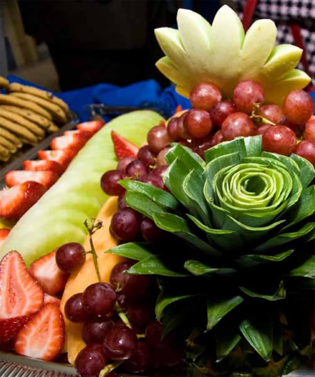 Photo of a banquet table filled with food