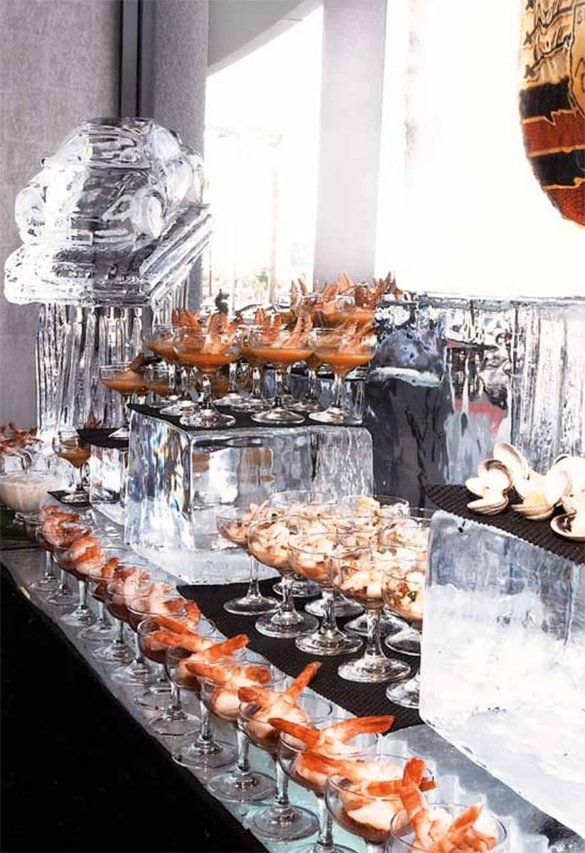 Photo of a banquet table filled with food