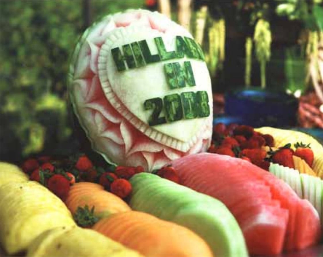 Photo of a banquet table filled with food